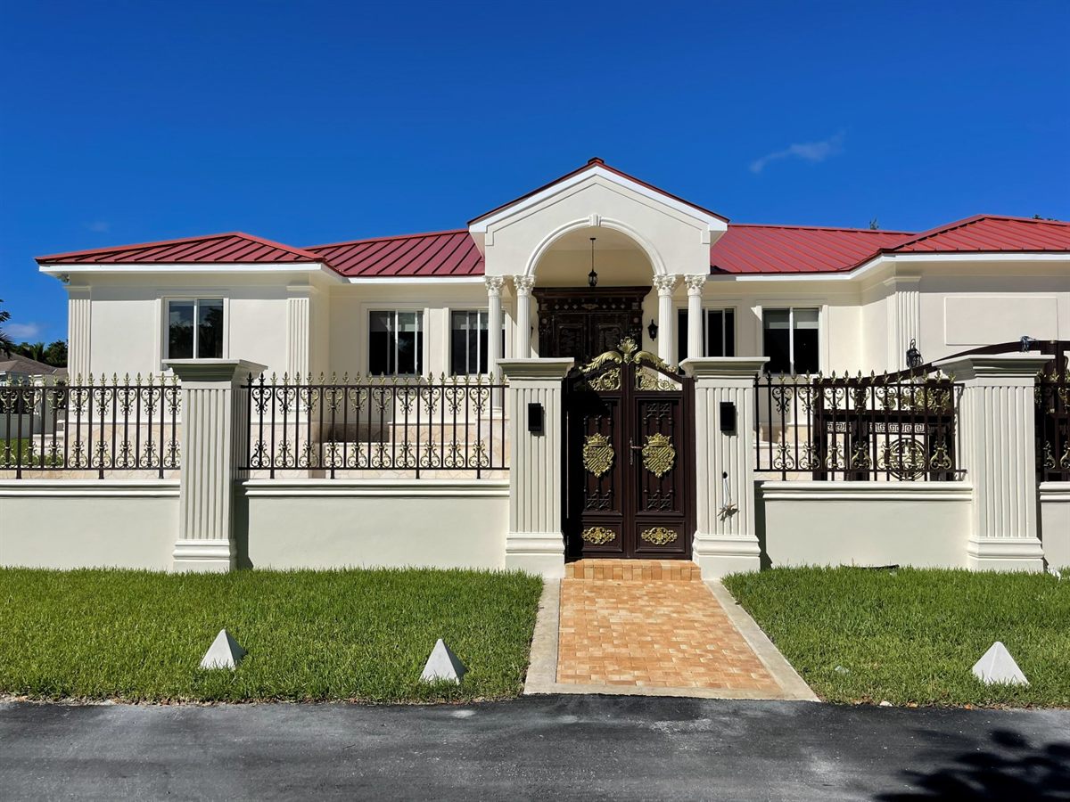 Lake Cunningham residence, completed front elevation with gates and red metal roof