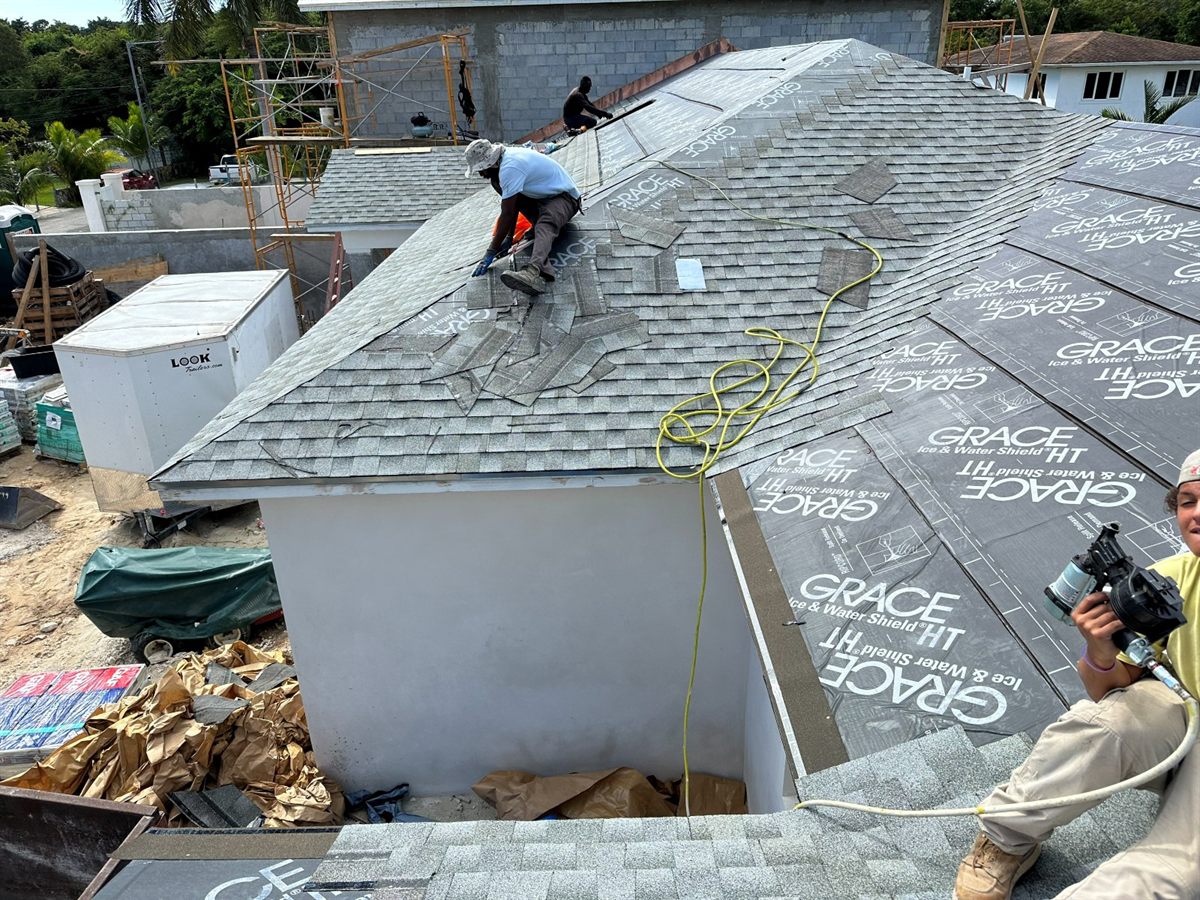 Crew laying Enviroshake over Grace Ice and Water Shield